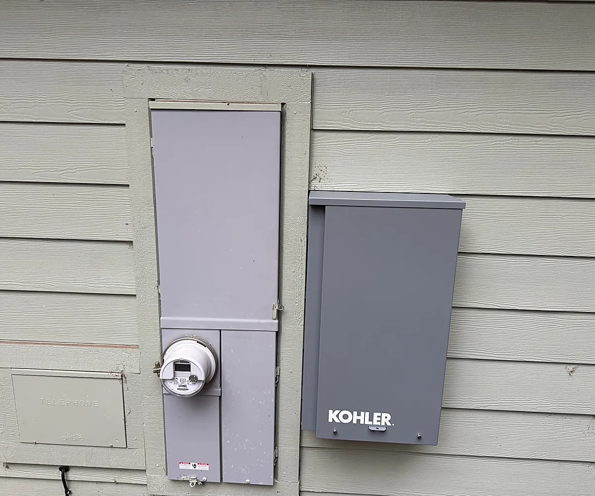Kohler automatic transfer switch beside meter