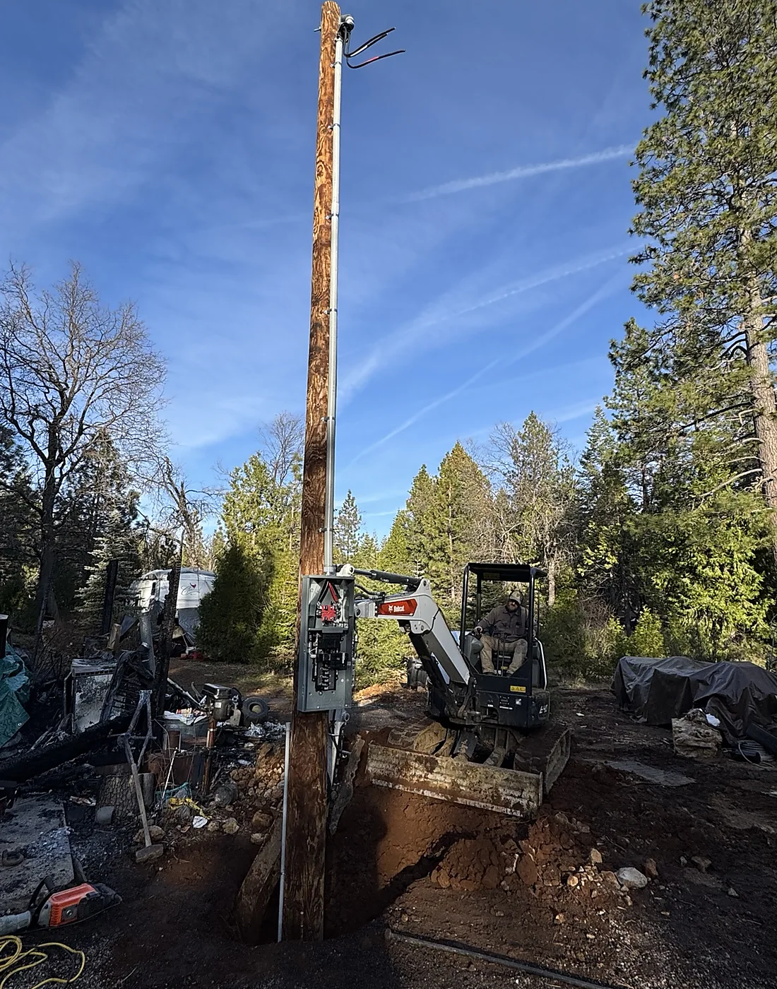 Pole-mounted service installation in progress